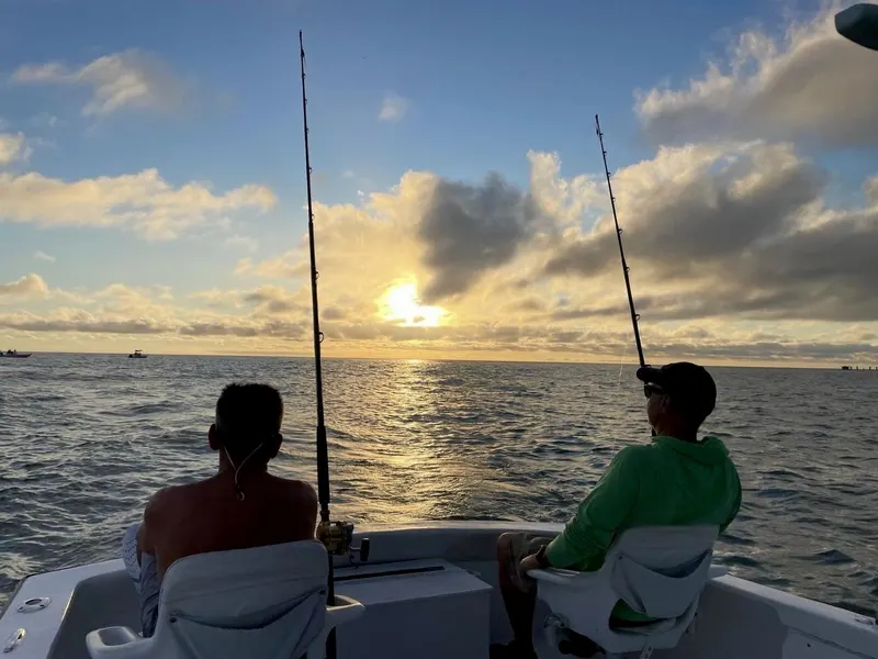 Two rods in the water at sunset off Boca Grande